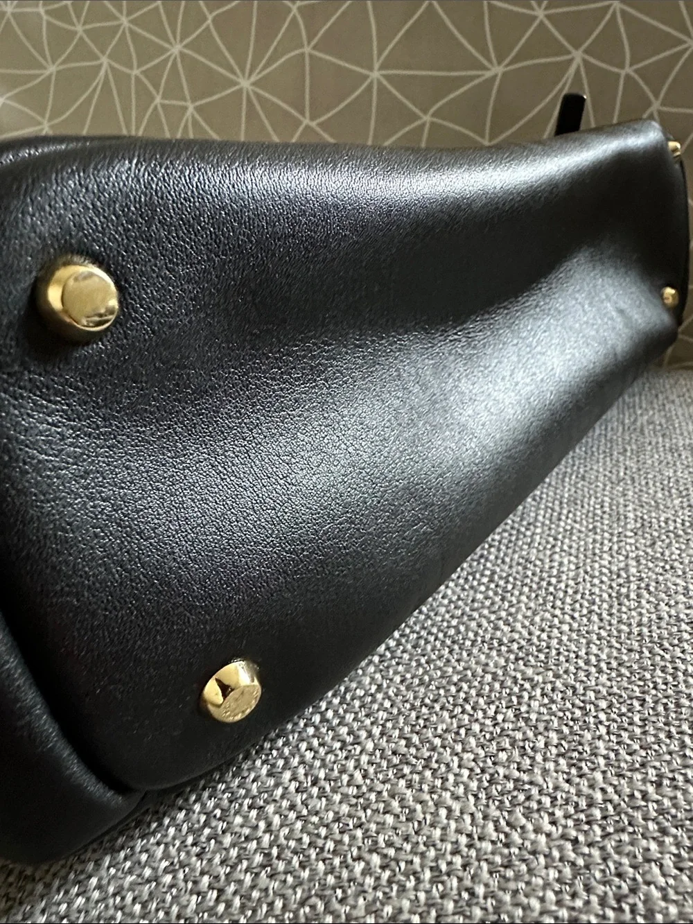 Tumi Leather Adrian Voyageur with Gold Hardware